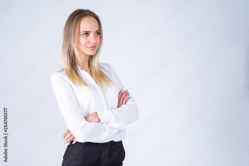 Beautiful girl standing on a white background Beautiful girl standing on a white background