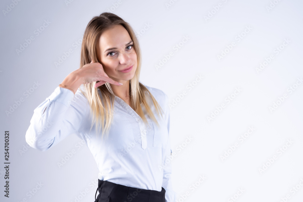 Businesswoman with hand show with call me sign Businesswoman with hand show with call me sign