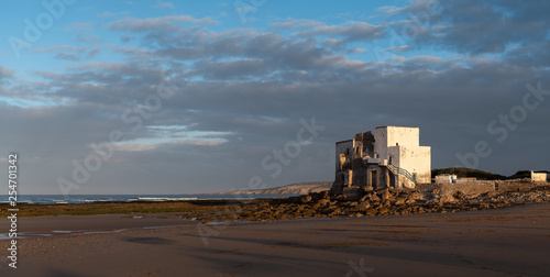 Old building at coast of Sidi Kaouki, Morocco, Africa.  Sunset time. morocco's wonderfully sleepy surf town