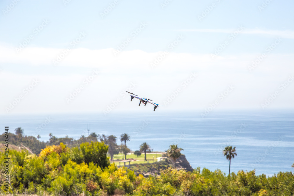 Fototapeta premium Drone in flight near the beach