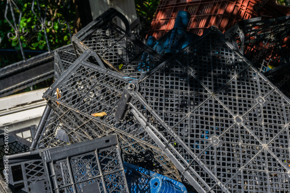 Fototapeta premium black plastic baskets for storing vegetables