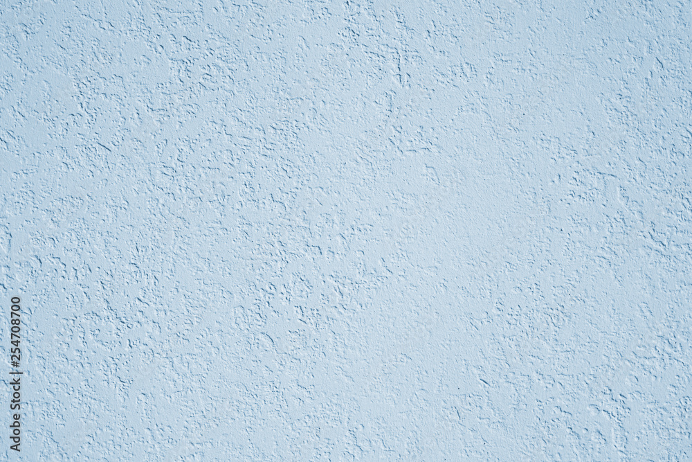 roughcast plaster wall background texture in light blue roughcast plaster wall background texture in light blue