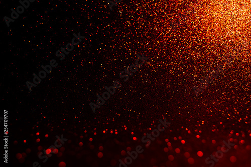 Soft image abstract bokeh gold,dark red with light background. Red ,maroon,black color night light elegance,smooth backdrop,artwork design for .new year,Christmas sparkling glittering Valentines day