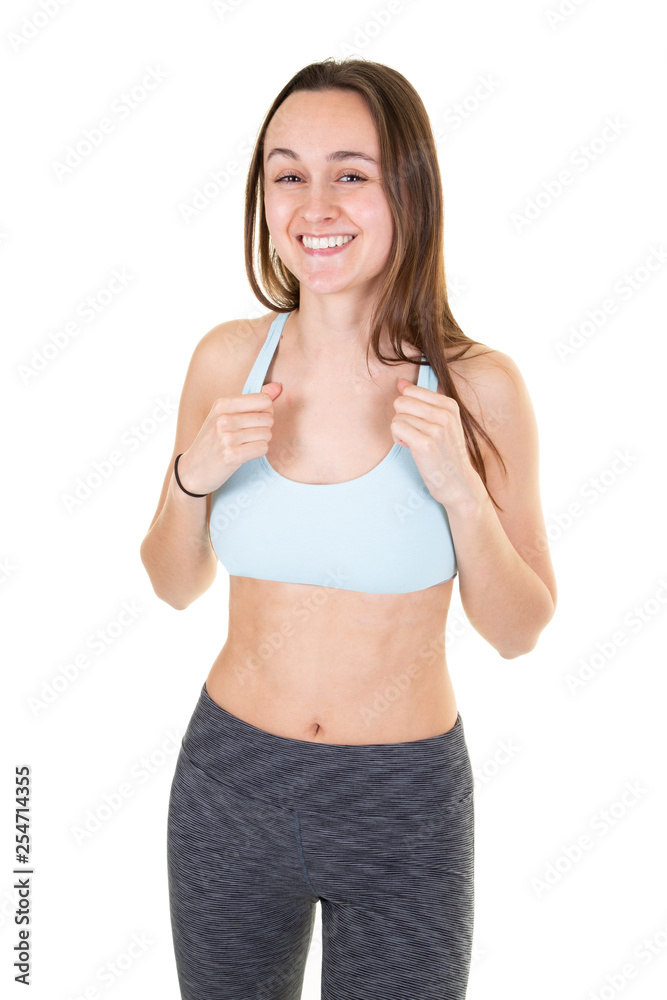 Beautiful young smiling sporty girl in studio Beautiful young smiling sporty girl in studio