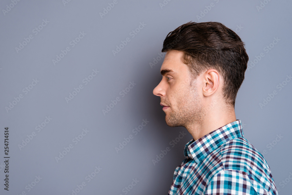 Close up side profile photo attractive amazing he him his man ideal perfect hairdo styling look interest empty space wearing casual plaid checkered shirt jeans denim outfit isolated grey background Close up side profile photo attractive amazing he him his man ideal perfect hairdo styling look interest empty space wearing casual plaid checkered shirt jeans denim outfit isolated grey background