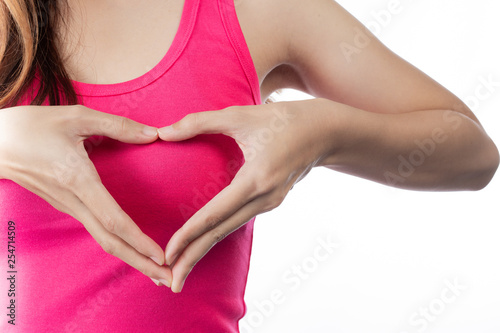 Beautiful woman, breast examination by herself (BSE) Breast Cancer Awareness (BSE).