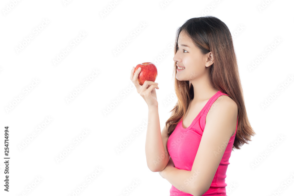 Asian beautiful woman with a happy smile, catching a fresh red apple in hand, isolated on a white background. Asian beautiful woman with a happy smile, catching a fresh red apple in hand, isolated on a white background.