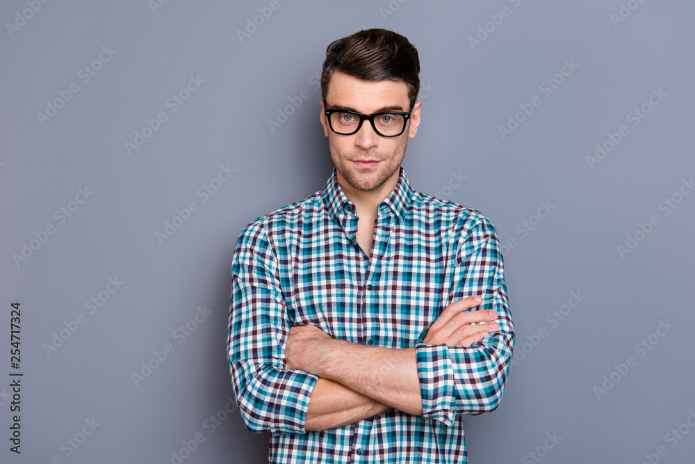 Portrait of nice well-groomed handsome attractive cute guy wearing checked shirt executive manager folded arms isolated over gray pastel background Portrait of nice well-groomed handsome attractive cute guy wearing checked shirt executive manager folded arms isolated over gray pastel background