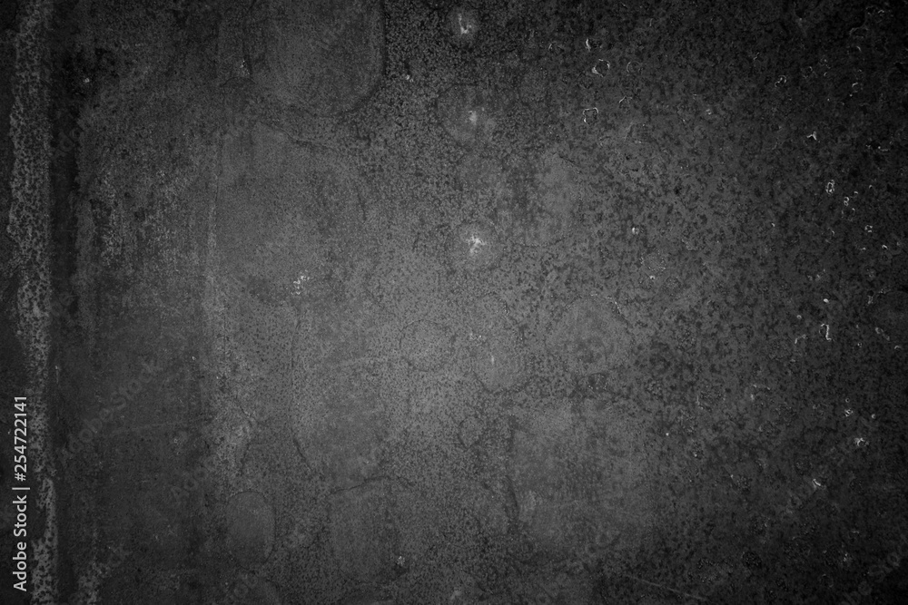Fototapeta premium black spotted metallic texture. dark rusty iron sheet