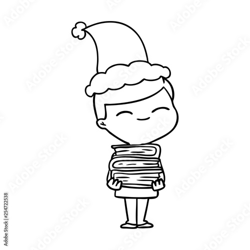 line drawing of a smiling boy with stack of books wearing santa hat