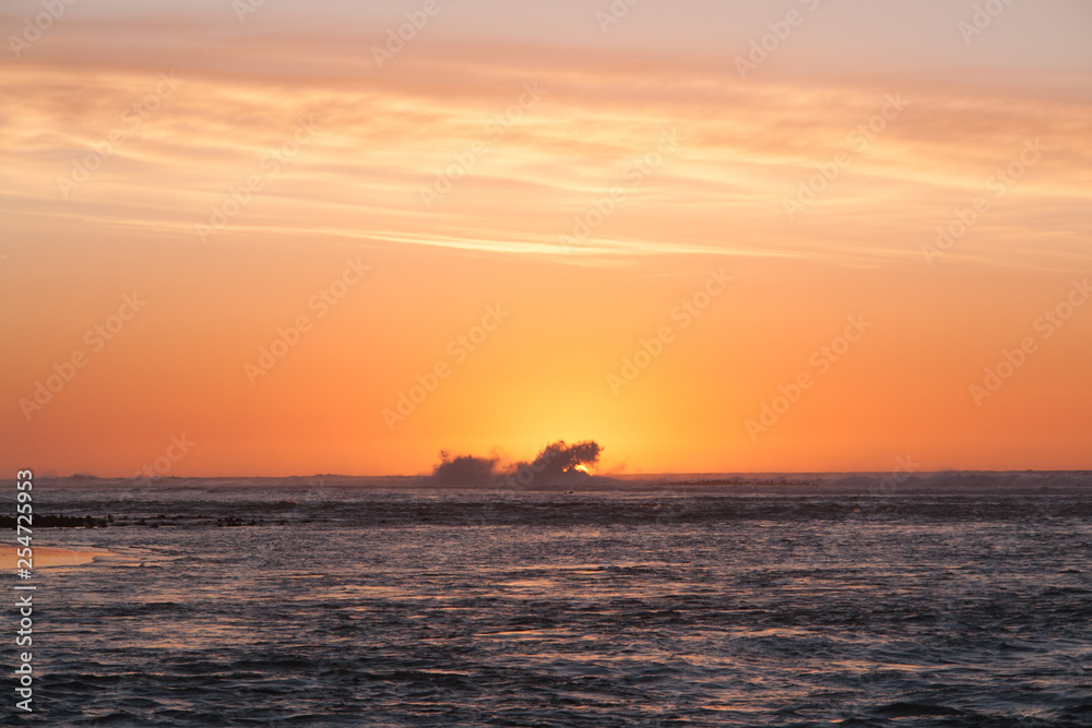 Sea sunset. Waves devour the last rays of the sun. Sea sunset. Waves devour the last rays of the sun.