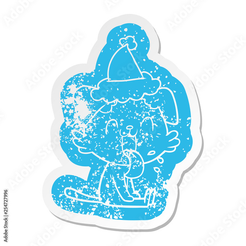 cartoon distressed sticker of a panting dog wearing santa hat