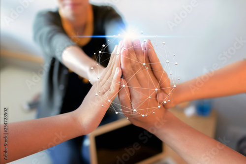 Group of Diverse Hands Together Joining with network Connection background .Teamwork concept photo
