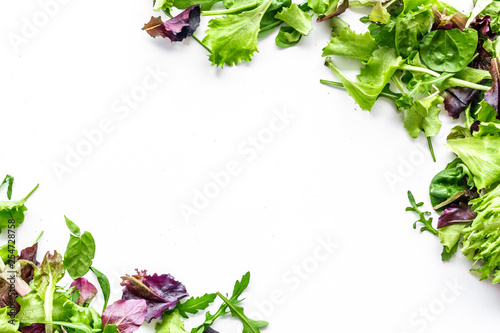 green and red salads for diet food on white background top view mockup