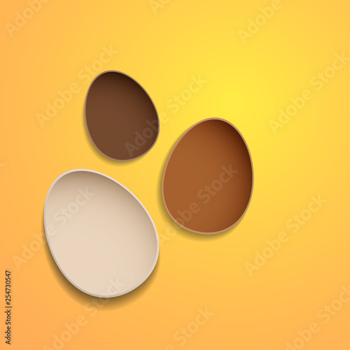 Wallpaper Mural Abstract chocolate easter eggs on yellow background Torontodigital.ca