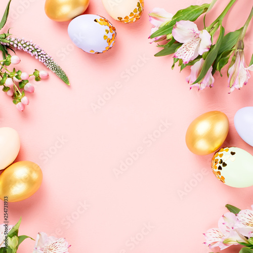Canvas Print Festive Happy Easter background with decorated eggs, flowers, candy and ribbons in pastel colors on pink