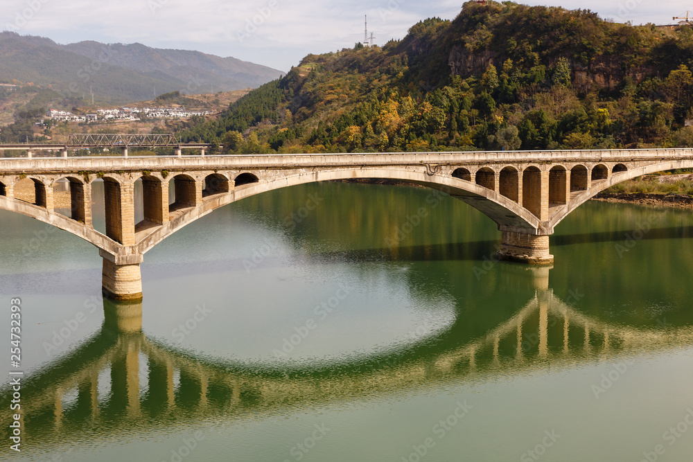 ancient stone bridge over the Bailong River, China