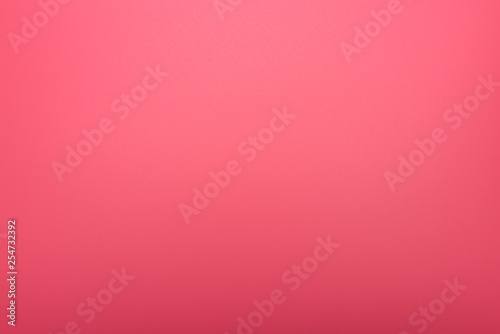 Texture in a bright, pink color illuminated with a delicate light.