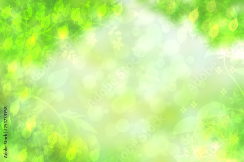 Abstract natural spring light green and yellow background texture with leaves and branches. Space for design.