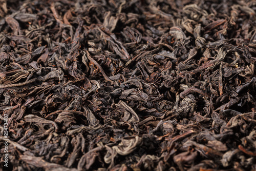 Dried tea leaves. Large leaf black tea.