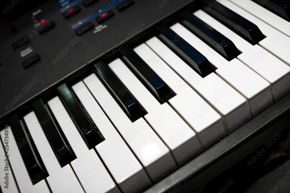 piano keyboard closeup music musician studio recording product photography sound electric harmony melody jingle piece song refrain tune air line theme piano keyboard closeup music musician studio recording product photography sound electric harmony melody jingle piece song refrain tune air line theme