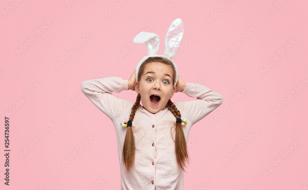 Excited girl in white ears screaming happily Excited girl in white ears screaming happily