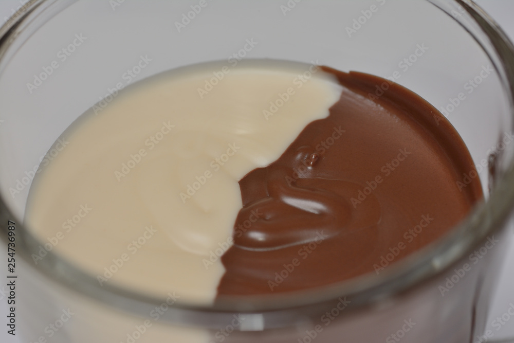 chocolate paste two-color dark and light, in glasswares close up chocolate paste two-color dark and light, in glasswares close up
