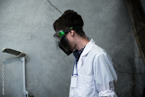 a scientist in a bunker in post-apocalypse photo