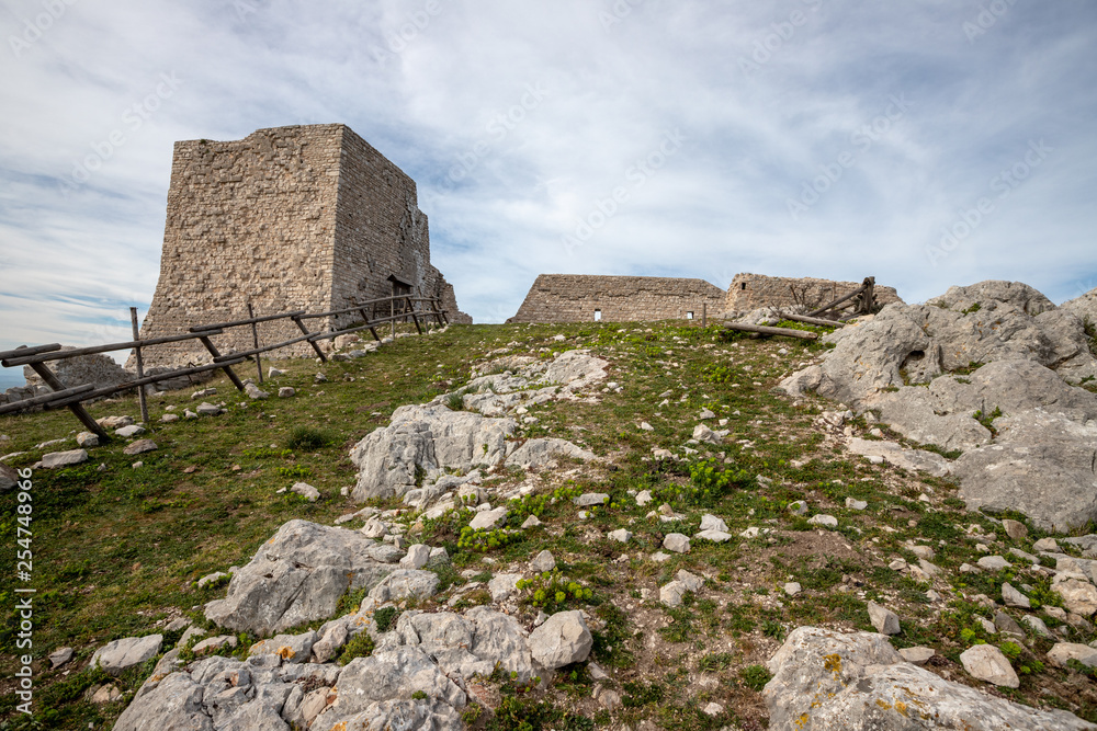 the ruins of Castel Pagano, built by the Normans, castle, church and necropoli built on the rocks. An archeological site in Gargano National Park, Apulia, Italy