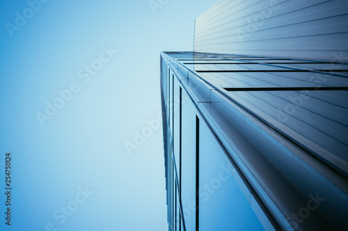 Modern skyscraper out of glass and blue sky