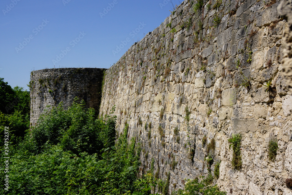 massive stone wall of castle ruin