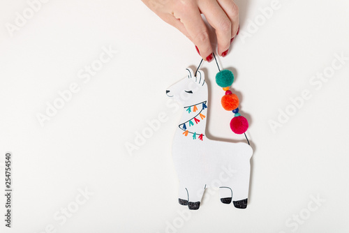 Wooden Llama on white background photo