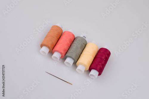 .composition of threads and needles for sewing