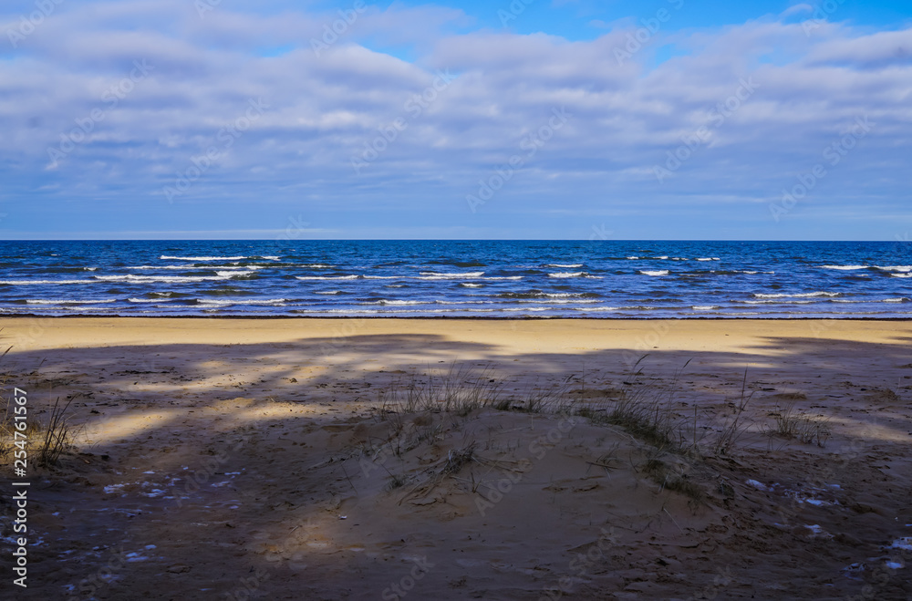 Early spring on the coast of the Gulf of Riga in Jurmala. Latvia.