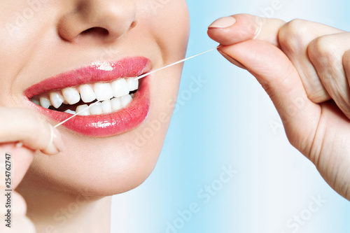 Beautiful young woman smile. Dental health background