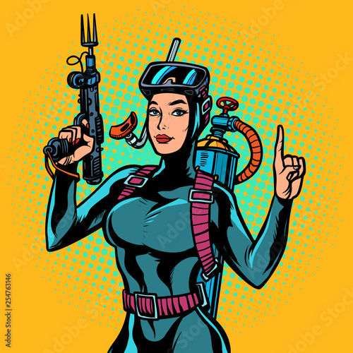 Aqua woman diver spearfishing gun