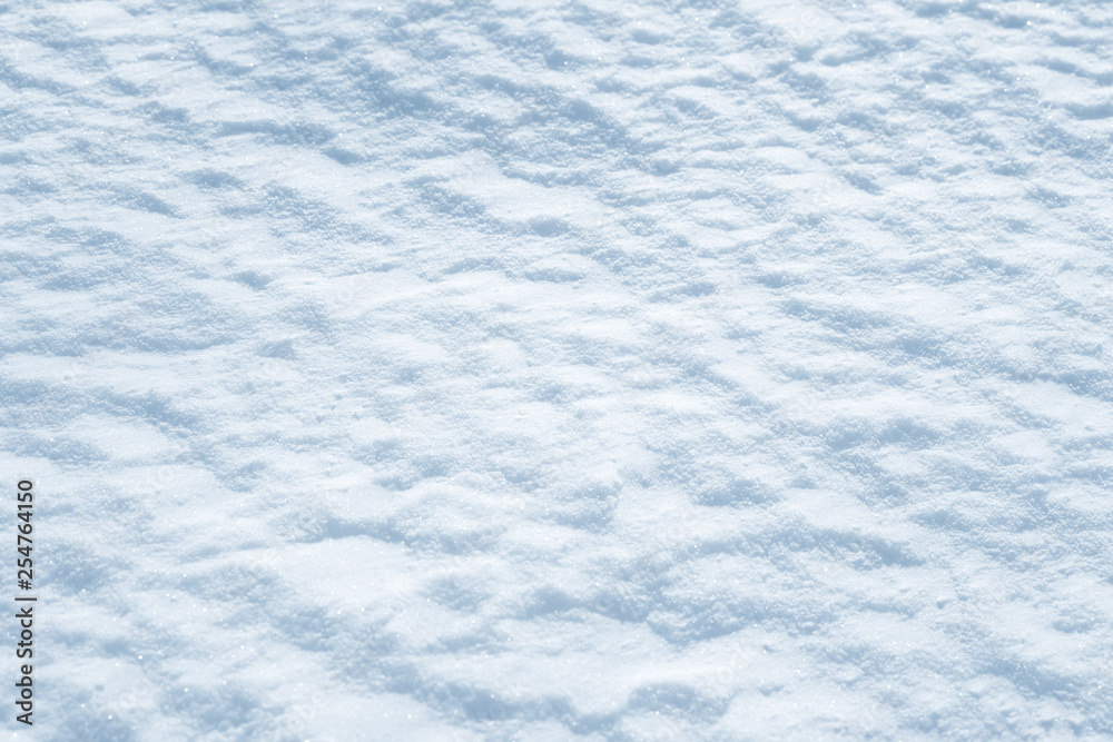 Fresh snow background texture. Winter background with snowflakes and snow mounds. Snow lumps. Fresh snow background texture. Winter background with snowflakes and snow mounds. Snow lumps.