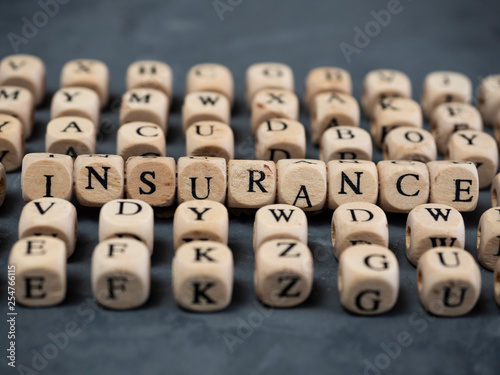 Wooden blocks with the word insurance