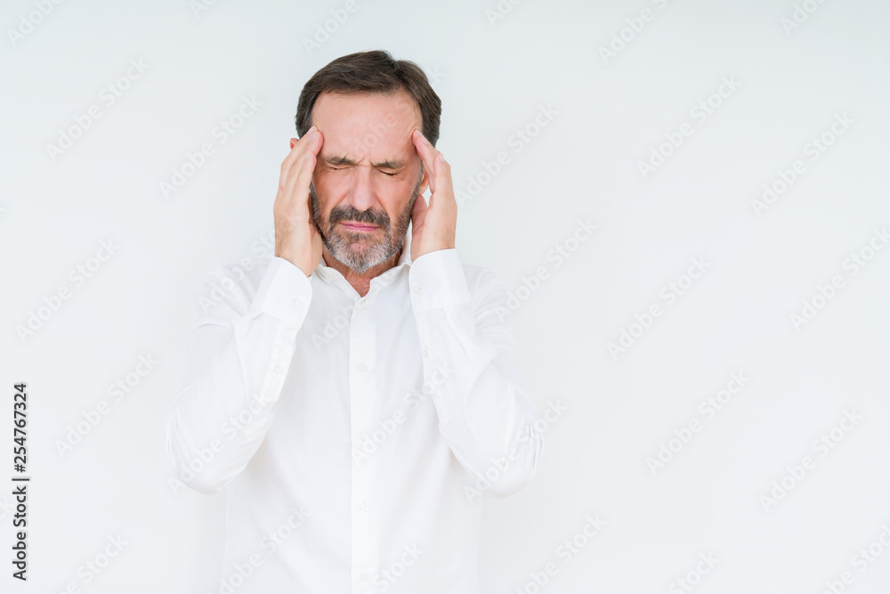 Elegant senior man over isolated background with hand on head for pain in head because stress. Suffering migraine. Elegant senior man over isolated background with hand on head for pain in head because stress. Suffering migraine.