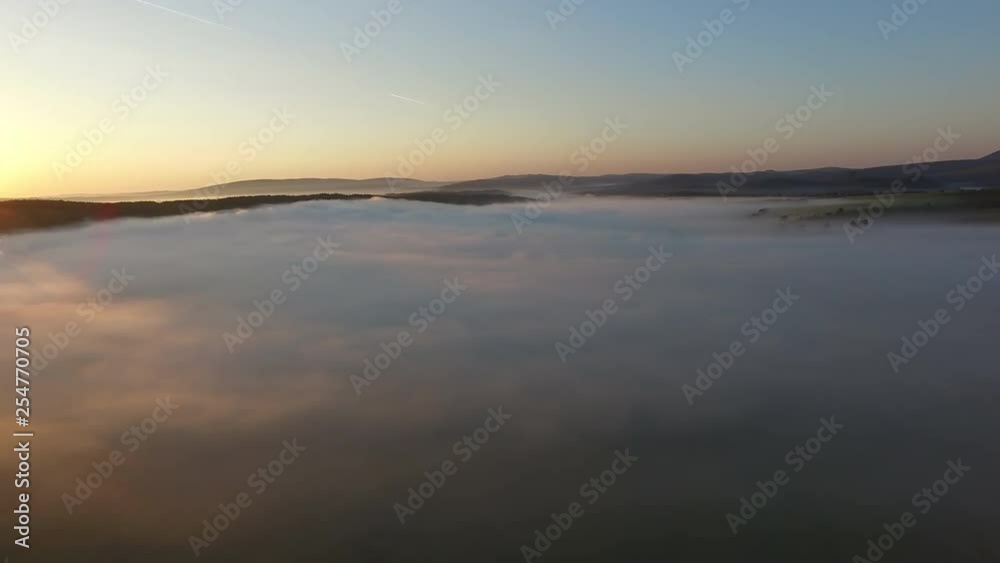 Aerial shot misty morning sunrise Aerial shot misty morning sunrise