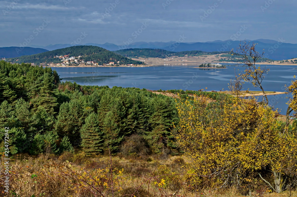 Amazing autumn view holiday village around Tsigov chark resort and Batak dam reservoir, Rhodope mountains, Bulgaria 