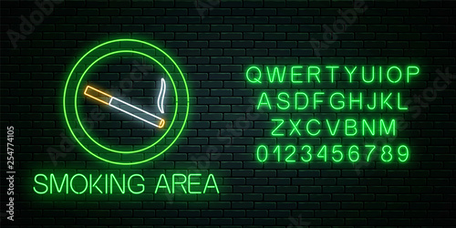 Glowing neon sign of smoking area with alphabet. Nicotine and smoke cigarettes site.