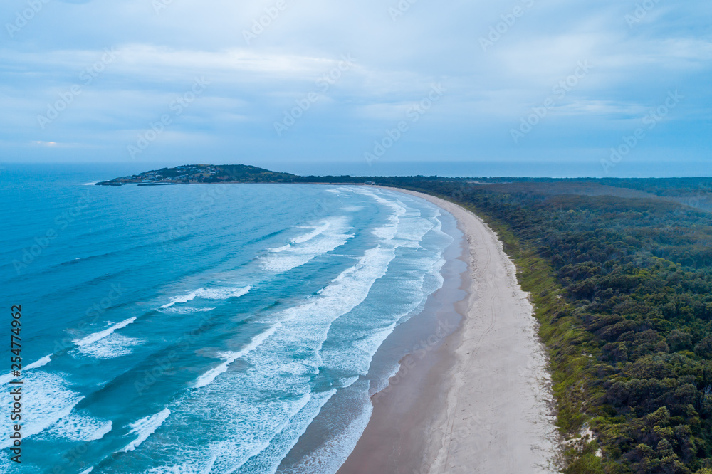 Aerial panorama of Crowdy Head and bay coastline at dawn. Crowdy Head, New South Wales, Australia