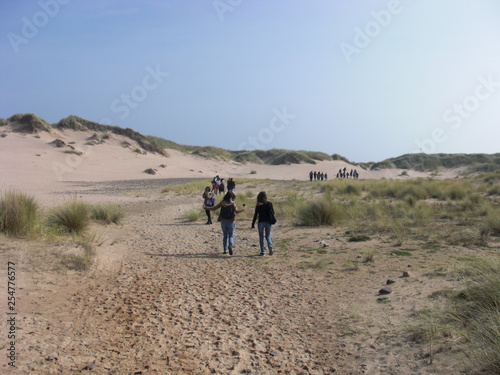 Walk along Sand Dunes on the Beach
