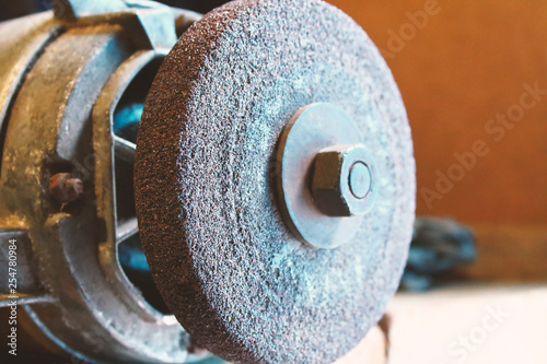 Old grinding machine. Close-up. Background. Texture.