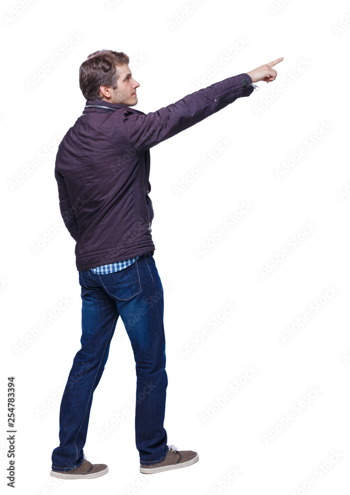 Back view of a man walking with a pointing hand.