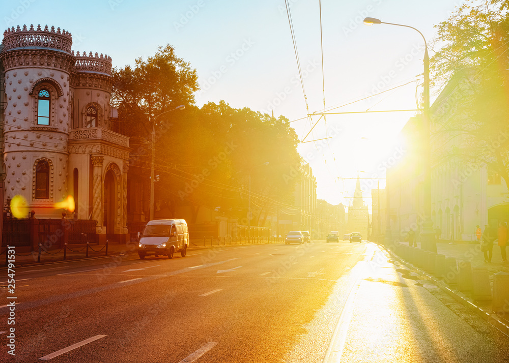 Romantic sunrise and street view with cars on road Moscow