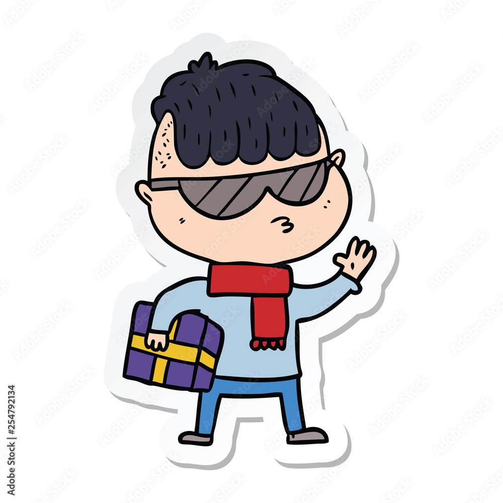 sticker of a cartoon boy wearing sunglasses carrying xmas gift sticker of a cartoon boy wearing sunglasses carrying xmas gift