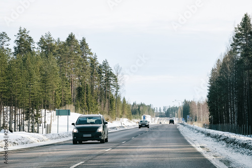 Landscape and car in road at snowy winter Lapland