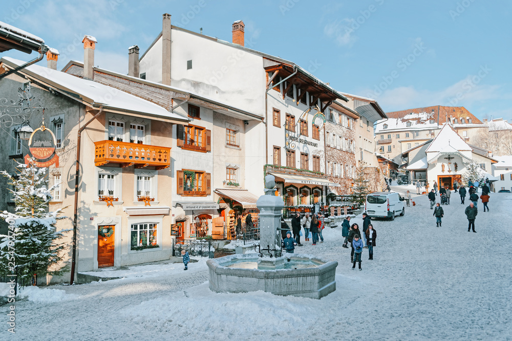 View of main street in swiss village Gruyeres - obrazy, fototapety, plakaty 